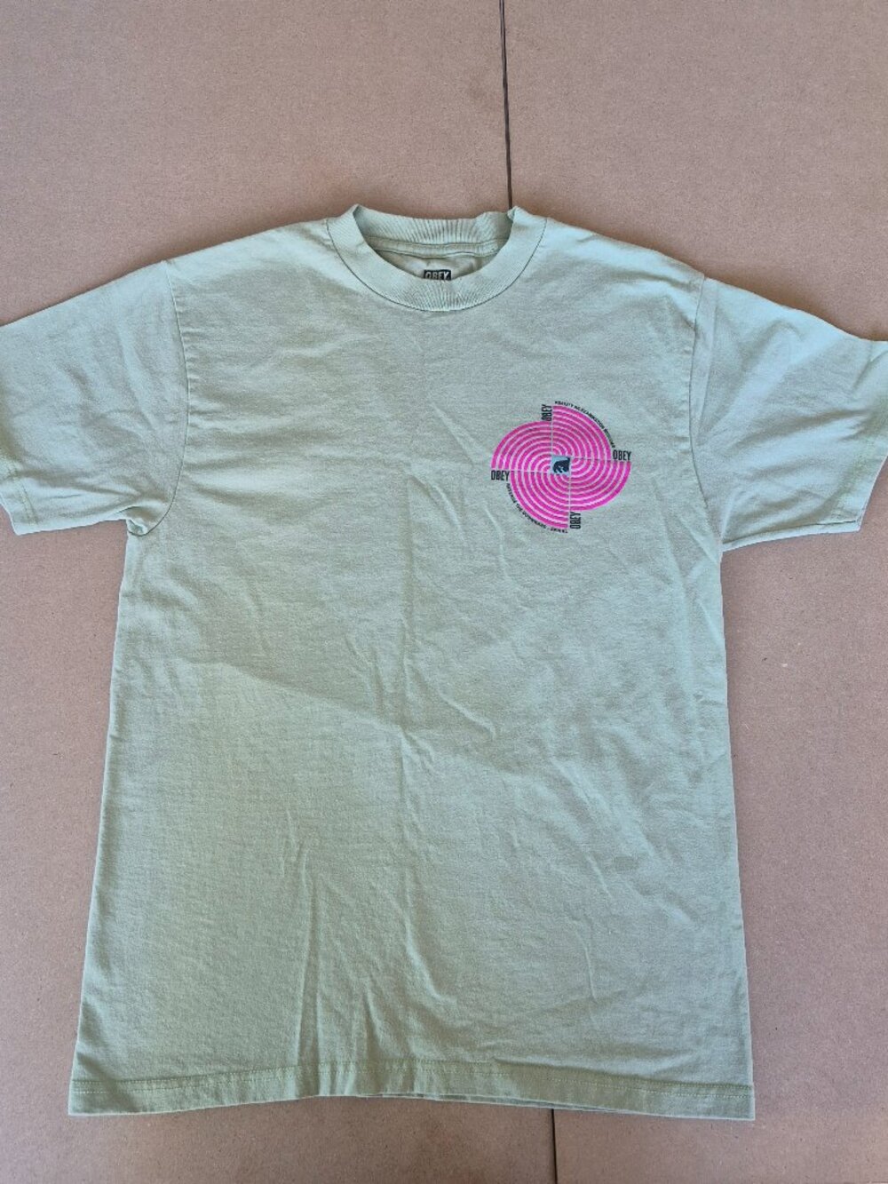 OBEY Men’s S Reverse Downward Spiral Graphic T Shirt Mint Green Pink Cotton